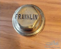 Brass hubcap for a vintage Franklin