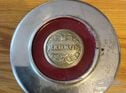 Large hubcap for a vintage Marmon
