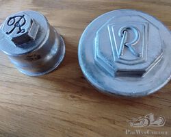 Two unknown vintage hubcaps