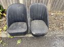 A pair of what are thought to be pre-war bucket seats