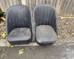A pair of what are thought to be pre-war bucket seats