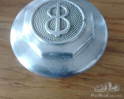 Early thirties aluminium aftermarket Buick hubcap