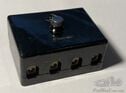 Black plastic fuse box - 4 way