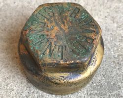 Clement Bayard brass hubcap