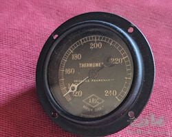 A rare ARIC flange mounted water temperature gauge as used by WO Bentley and similar.